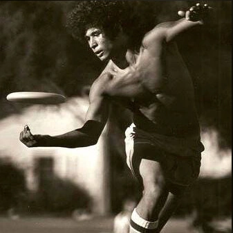 Frisbee Fun: 1970s Hippies in Short Shorts at the Park