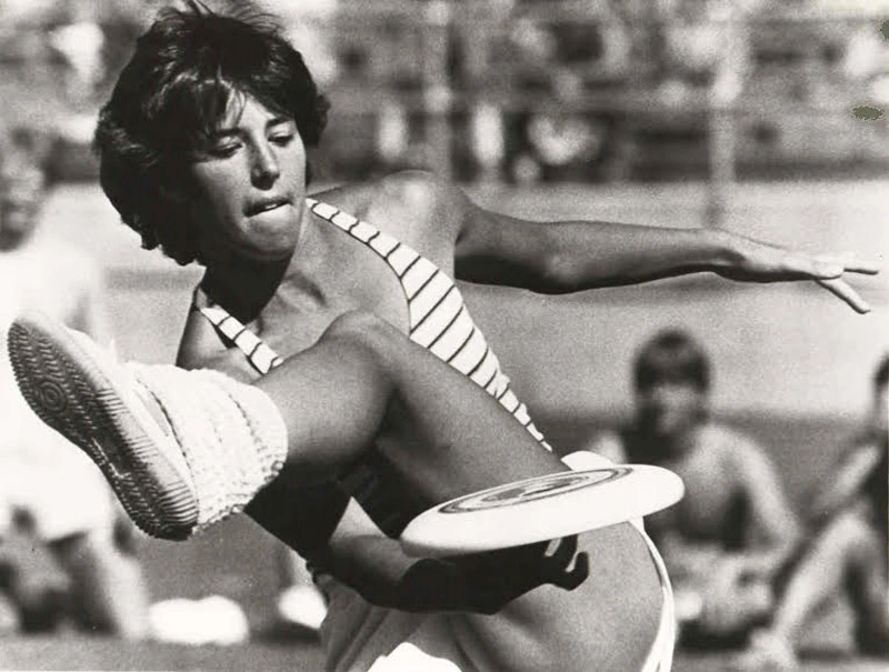 Frisbee Fun: 1970s Hippies in Short Shorts at the Park