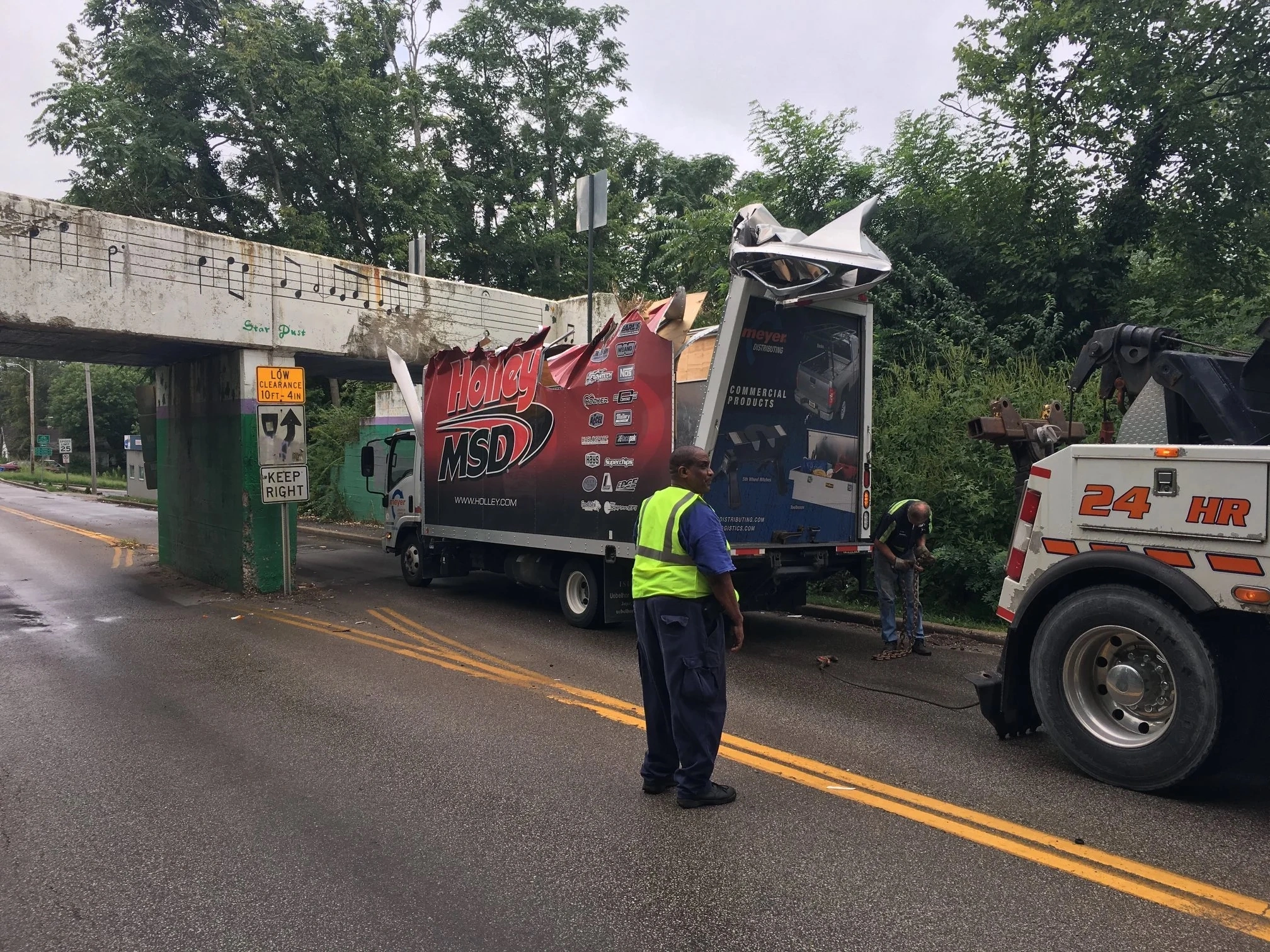 23 Truck Drivers Who Were Convinced They Could Squeeze Under That Bridge