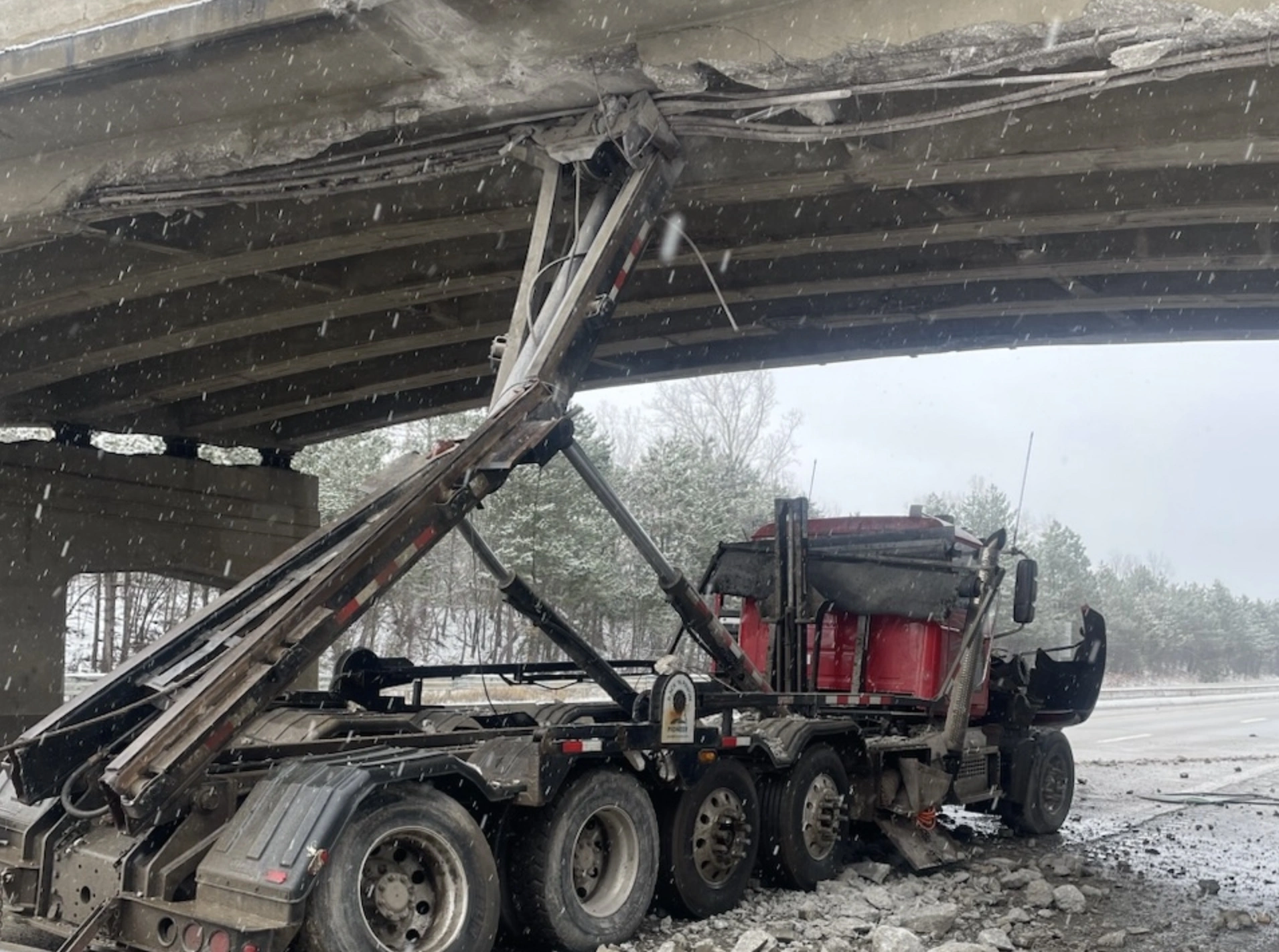 23 Truck Drivers Who Were Convinced They Could Squeeze Under That Bridge