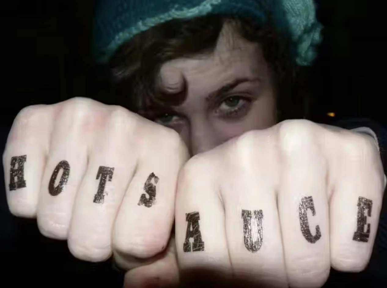 24 Finger Tattoos People Likely Got When They Were Feeling Peckish